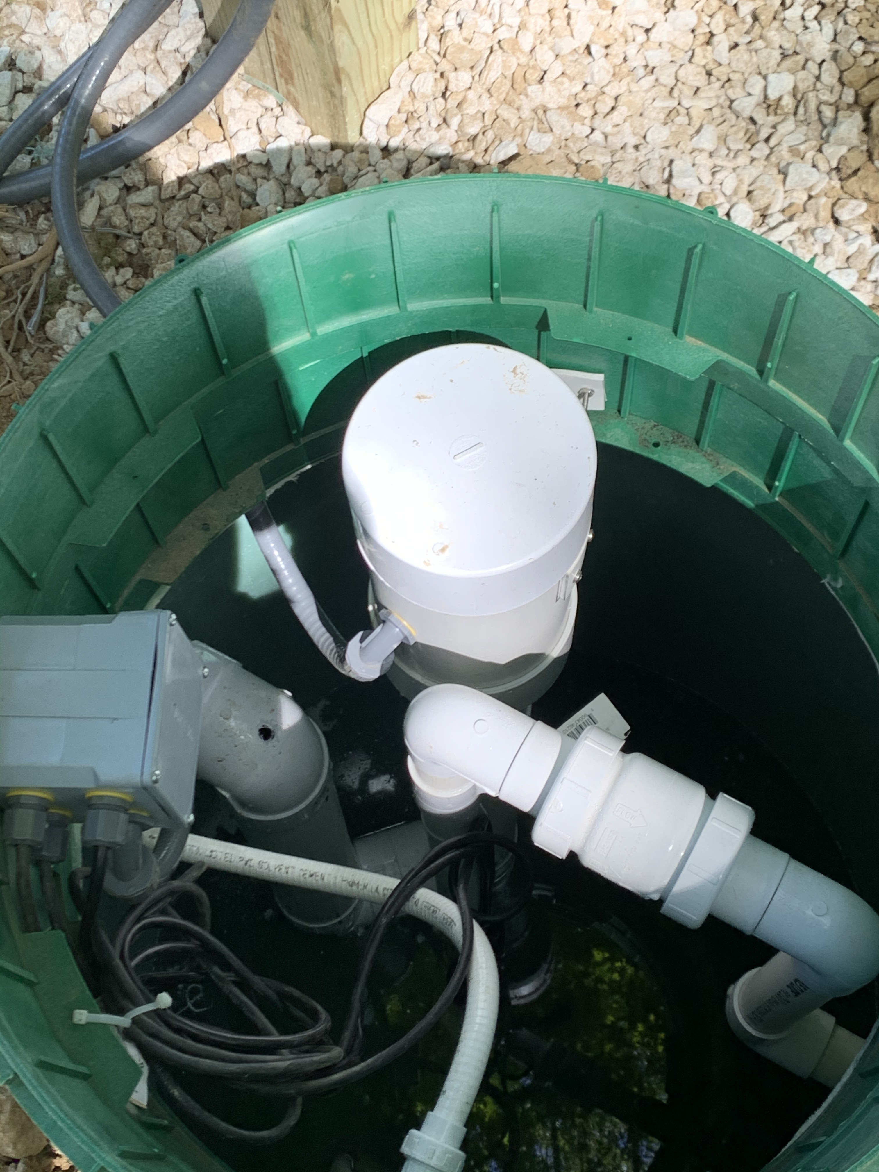 Inside view of septic tank components - Importance of septic tank inspection before purchasing a house for reliable septic system performance.